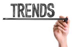 Hand with marker writing the word Trends-1.jpeg